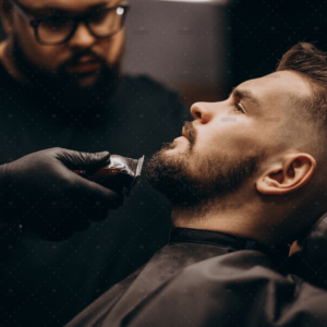 handsome-man-cutting-beard-barber-salon.jpg